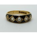 An 18ct gold mourning ring set with three pearls and two old cut diamonds in square settings on a