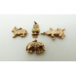 Four 9ct gold charms, elephant, frog, rabbit and owl, 4.