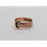 A 9ct rose gold buckle ring, 2.
