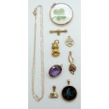 A 9ct gold pendant, a yellow metal pendant set with an amethyst,