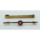 A 9ct gold brooch set with a pink paste and a yellow metal brooch