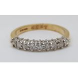 An 18ct gold half eternity ring set with diamonds totalling approximately 0.33ct, 3.
