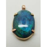 A 9ct gold pendant set with a black opal cabochon, 2.