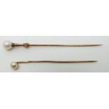 Two Victorian stick pins set with a pearl to each