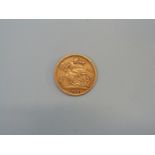 A 1900 gold half sovereign.