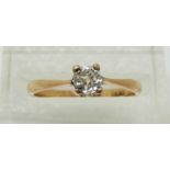 An 18ct gold ring set with an old cut diamond measuring approximately 0.25ct, 1.