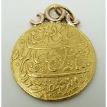 An Arabic/ Mahal gold coin on a pendant mount, 13.