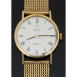 Rolex Cellini 18ct gold ladies wristwatch with black hands and Roman numerals to champagne face,