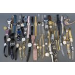 Fifty-three various ladies and gentleman's wristwatches.