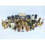 Approximately 40 alcohol miniatures, mainly whisky, including Bunnahabhain 12 year, Tomatin 10 year,