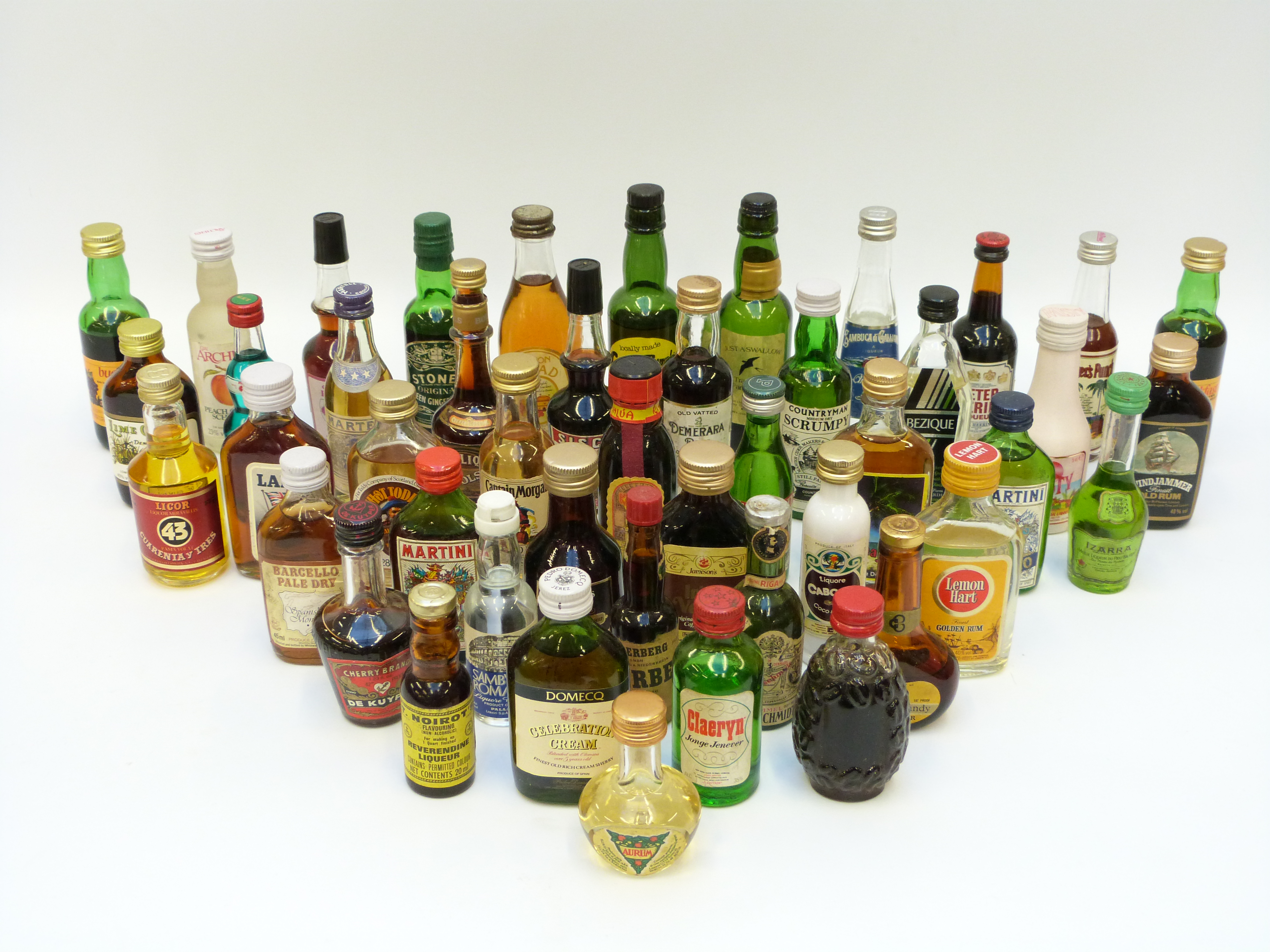 Approximately 20 novelty alcohol miniatures including Archers Peach County Schnapps, Remerara rum,