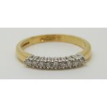 An 18ct gold ring set with diamonds, total diamond weight approximately 0.2ct, 2.