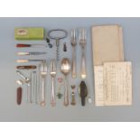 Hallmarked silver cutlery with English and continental marks, a corkscrew, hat pins, badges,