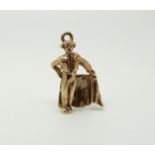 A 9ct gold charm in the form of a bull fighter, 2.