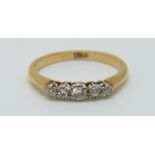 An 18ct gold ring set with five diamonds, 2.