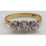 An 18ct gold Victorian ring set with three old English cut diamonds,