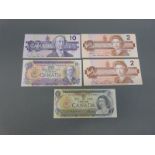 A 1971 Canada 10 dollar bank note replacement Lawson/ Bokey, AU, together with a 1989 example,