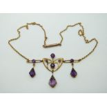 An Art Nouveau necklace marked 9ct set with amethysts, 6.