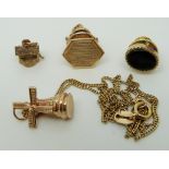 A 9ct gold necklace, 9ct gold tie pin and a 9ct gold charm (5.