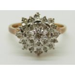 A 9ct gold ring set with diamonds in a cluster, 3.
