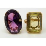 A 14ct gold ring set with a purple sapphire and an 18ct gold ring set with a large citrine