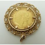 A 1910 gold half sovereign in 9ct gold mount, 7.