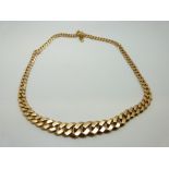 A French 18ct gold graduated curb link necklace,