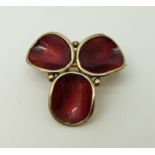 A silver brooch set with red enamel marked 925 Norway,