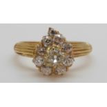 An 18ct gold Victorian ring set with old cut diamonds in the form of a heart,