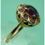 A 9ct gold ring set with amethysts in a cluster, 4.