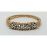 An 9ct gold ring set with diamonds, 1.