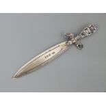 An Edward VII hallmarked silver bookmark in the form of an ornate sword, Birmingham 1903,