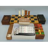 A collection of vintage games including cased Rubicon Bezique with two ivory mounted counters,