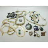 A collection of silver jewellery to include necklaces, bracelet, pendants, agate necklace,