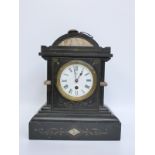 A slate mantel clock with marbled inlaid decoration, PFB to Roman enamelled dial,