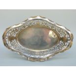 A hallmarked silver pierced boat shaped dish or bowl, marks rubbed, length 31cm,