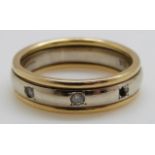 A 9ct gold ring set with diamonds, 4.