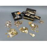 Overseas currency and two tins of miscellaneous coinage,