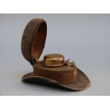 A novelty inkwell in the form of a Stetson/cowboy hat,