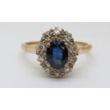 An 18ct gold ring set with an oval sapphire,