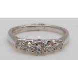 An 18ct white gold ring set with five diamonds totalling approximately 0.5ct,3.