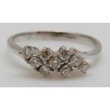 A 14ct white gold ring set with diamonds, 2.