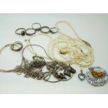 A collection of silver jewellery to include necklaces, pearl necklaces, silver rings,