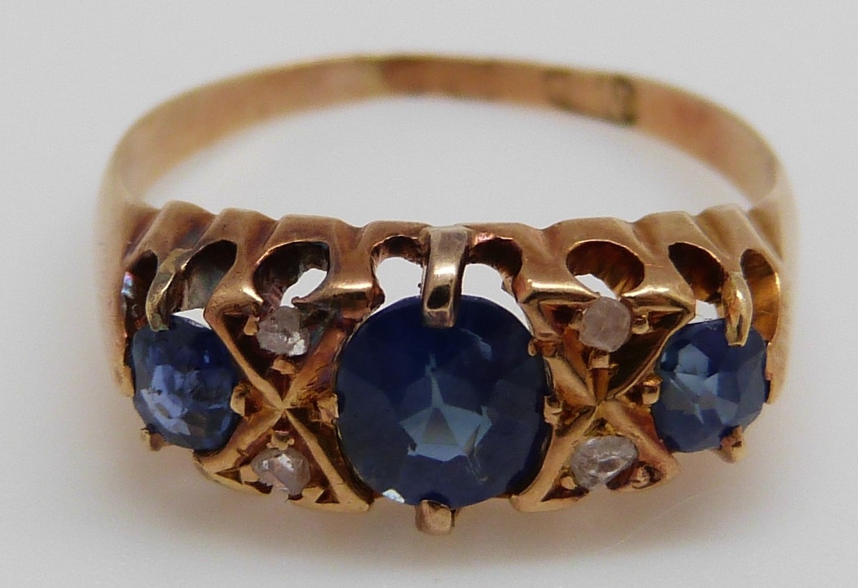 An 18ct gold ring set with three oval cut sapphires and four diamonds (size K/L) - Image 5 of 8
