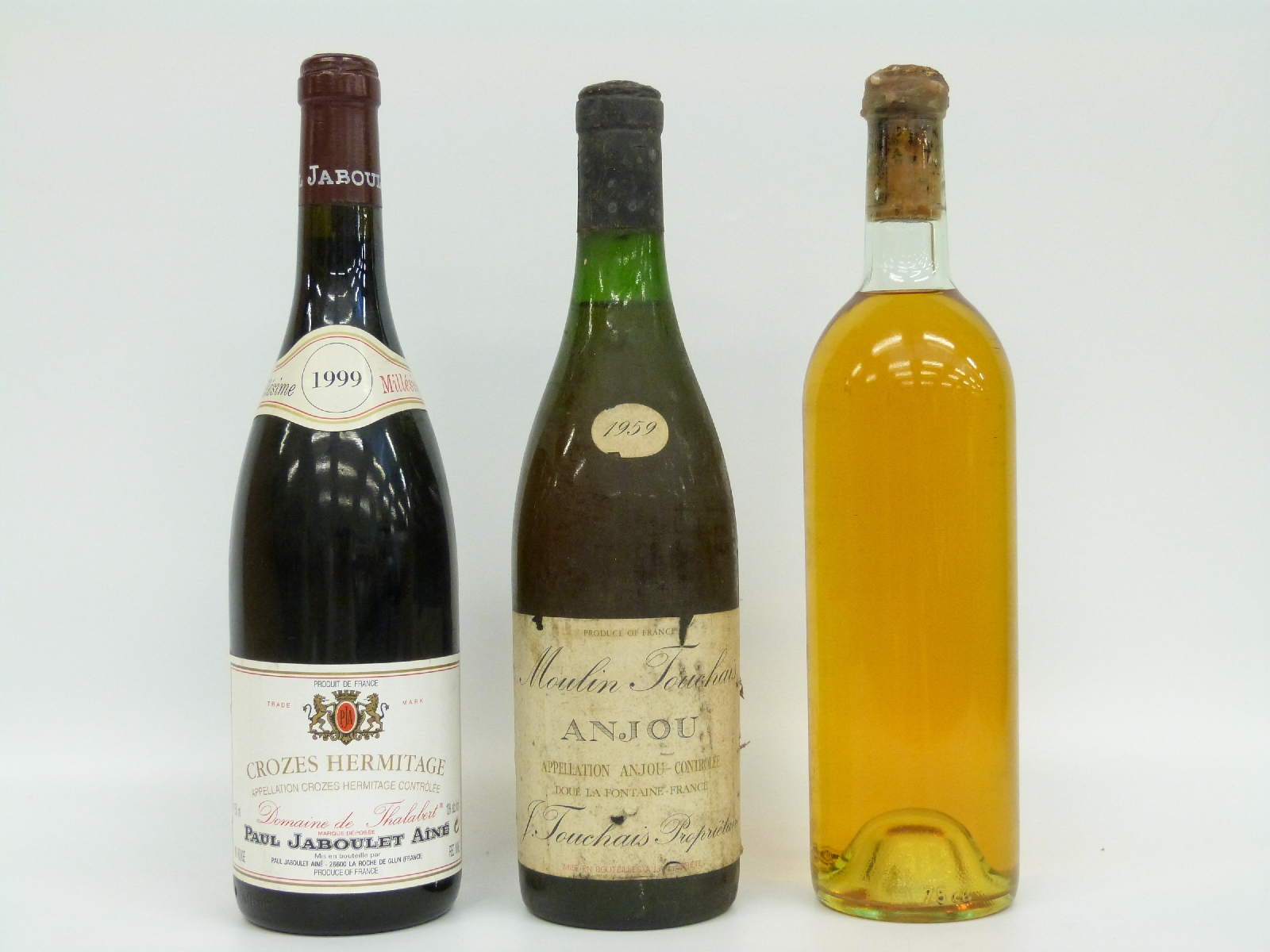 Three bottles of wine including Moulin Touchais 1959 Anjou 73cl,