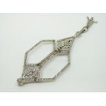 An Art Deco platinum lorgnette pendant set with rose cut and round cut diamonds,