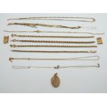 A collection of 9ct gold chains and a 9ct gold locket, 23.