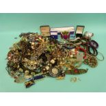 A collection of costume jewellery including bangles and beads