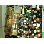 Approximately 80 assorted alcohol miniatures, some whisky including Smiths, Glenlivet,