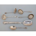 Four Victorian and later hallmarked silver sifter spoons, one Birmingham 1890,